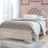 Realyn Upholstered Panel Bed