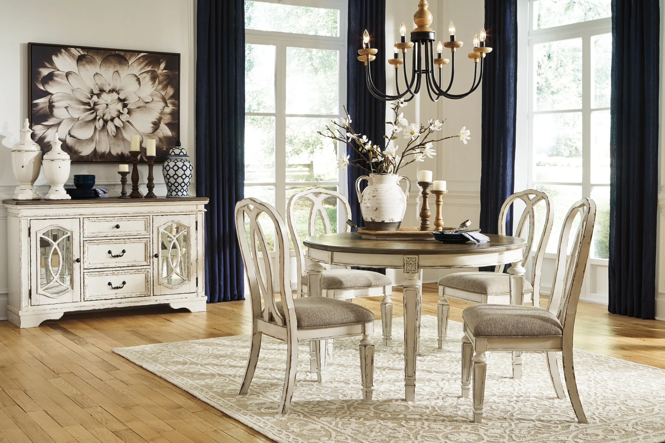 Realyn Round Dining Extension Table