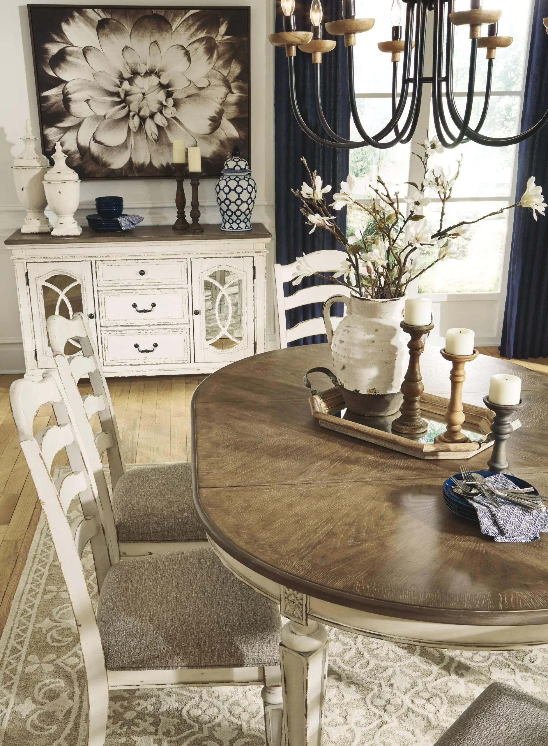 Realyn Round Dining Extension Table