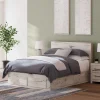 Ashley Lawroy Panel Six Drawer Storage Bed