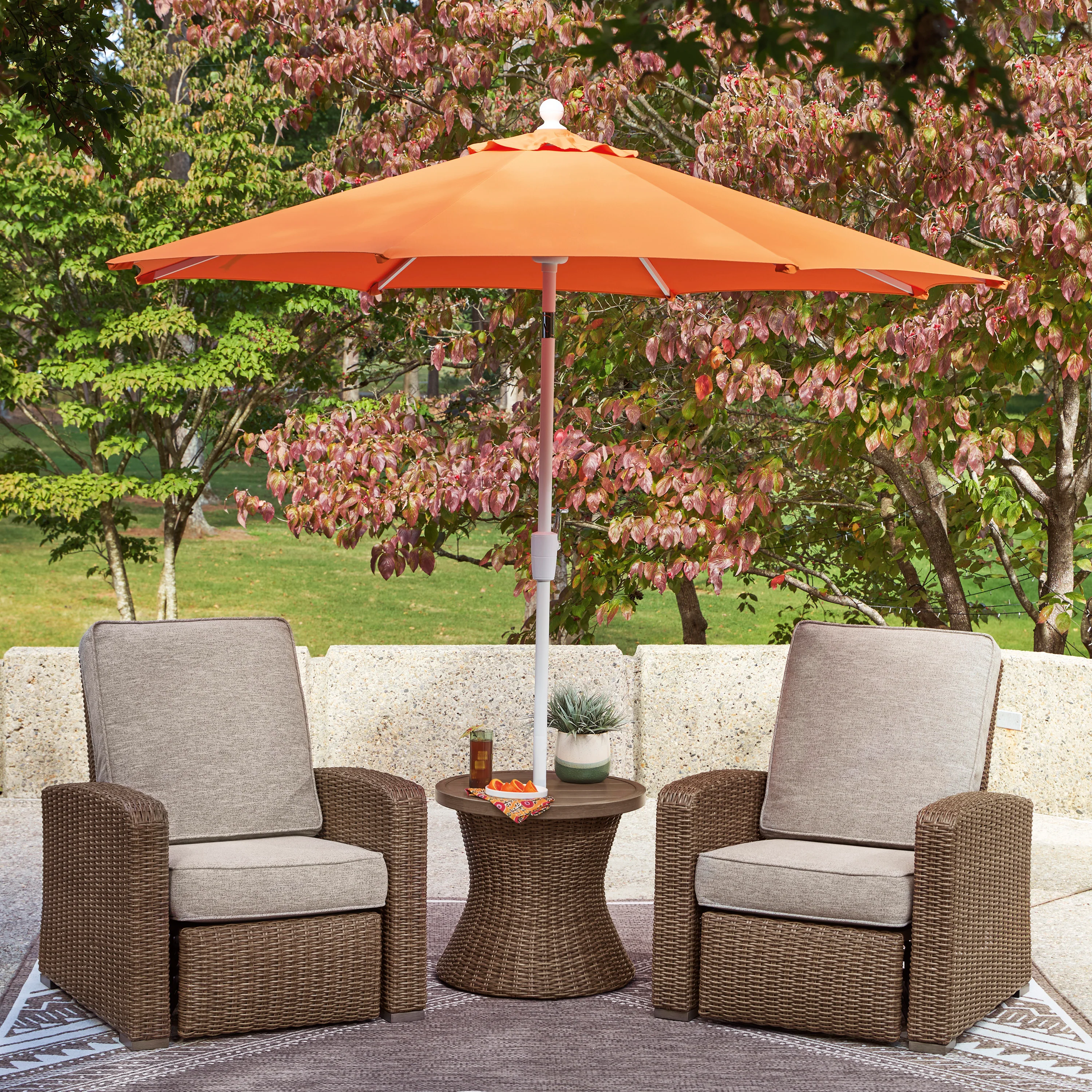 5009-ashley-revare-beach-outdoor-patio-round-end-table-2.webp Ashley Revare Beach Outdoor Patio Round End Table