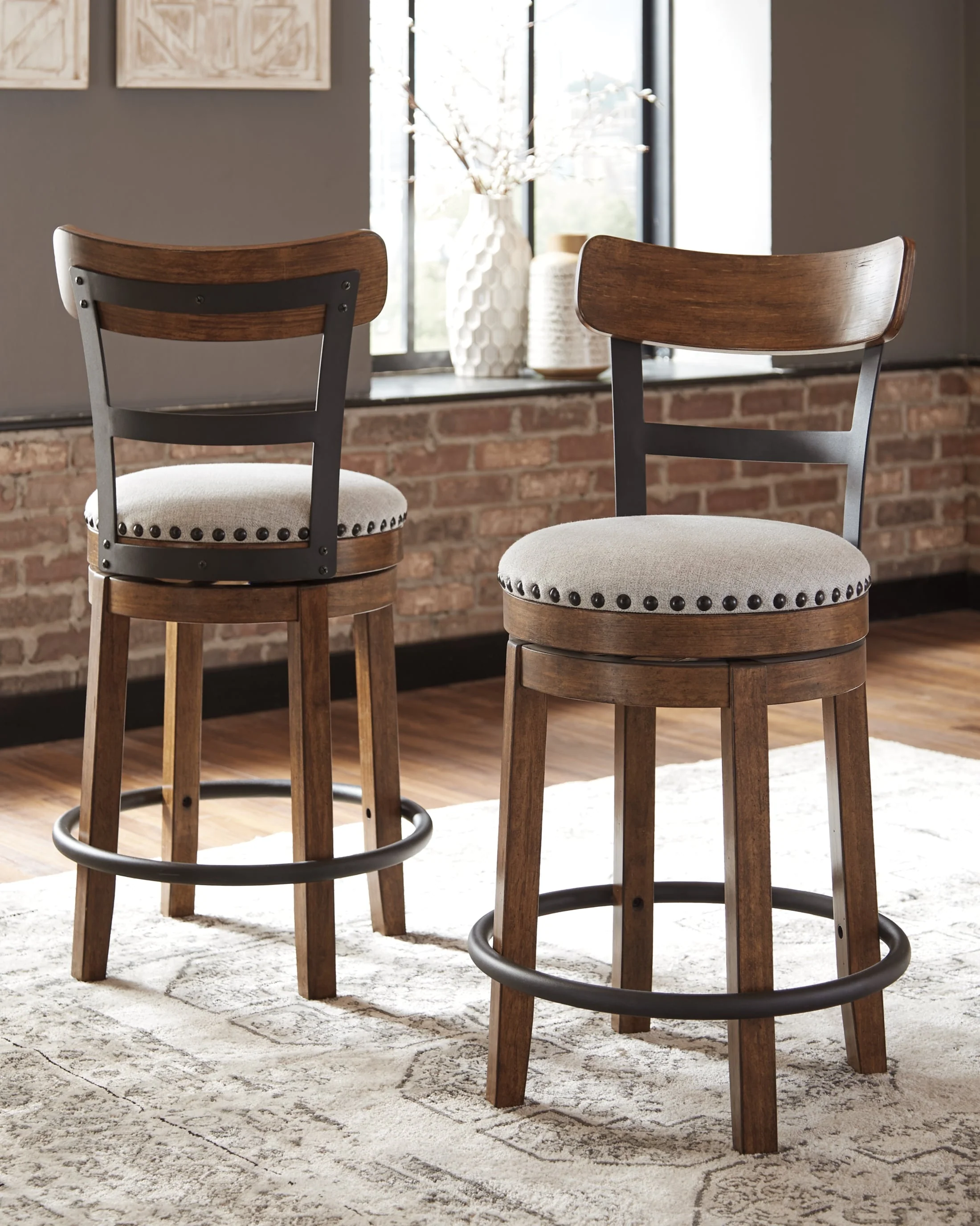 93-ashley-valebeck-counter-height-upholstered-swivel-bar-stool-with-contoured-back-2.webp Ashley Valebeck Counter Height Upholstered Swivel Bar Stool with Contoured Back